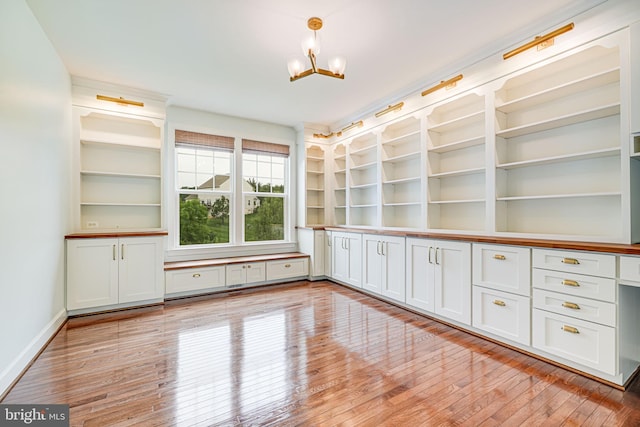 7425 Signal Hill Rd, Manassas, VA 20111 - unfurnished room featuring a chandelier and light wood-style floors