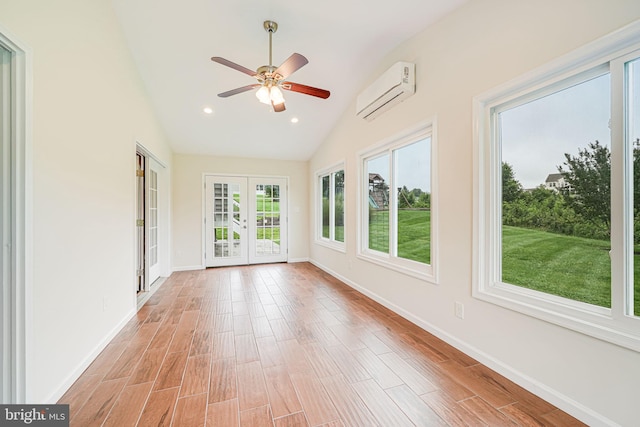 7425 Signal Hill Rd, Manassas, VA 20111 - unfurnished sunroom with french doors, a wall unit AC, vaulted ceiling, wood finished floors, and recessed lighting