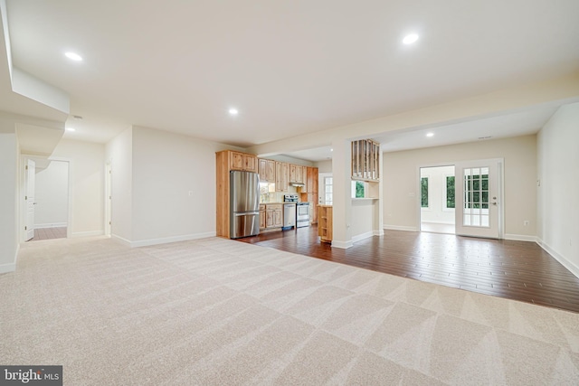7425 Signal Hill Rd, Manassas, VA 20111 - unfurnished living room with dark carpet and recessed lighting
