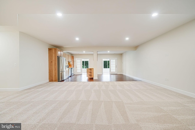 7425 Signal Hill Rd, Manassas, VA 20111 - unfurnished living room featuring recessed lighting and light carpet
