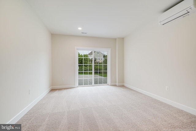 7425 Signal Hill Rd, Manassas, VA 20111 - empty room featuring a wall unit AC, carpet floors, and recessed lighting