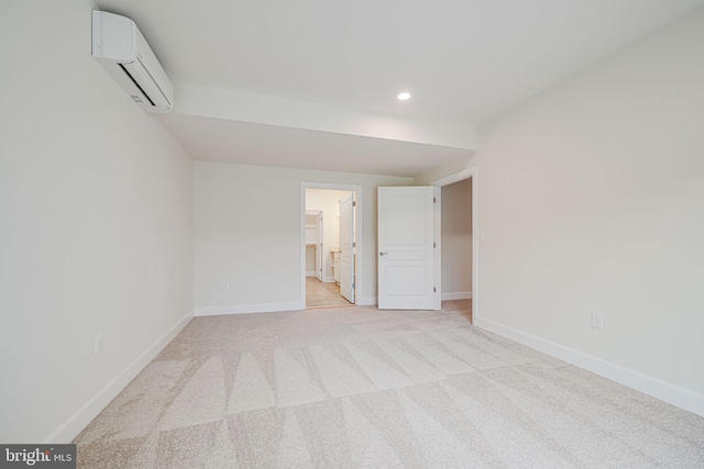 7425 Signal Hill Rd, Manassas, VA 20111 - unfurnished bedroom with a wall unit AC, recessed lighting, light carpet, and ensuite bath