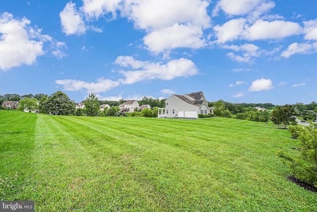 7425 Signal Hill Rd, Manassas, VA 20111 - view of green lawn featuring an attached garage