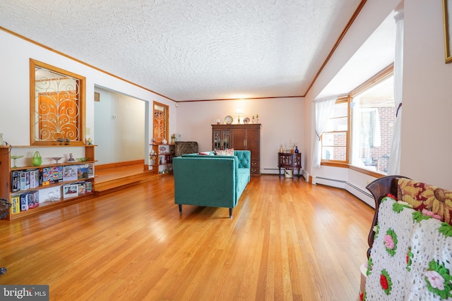 5509 Waterview Dr, Cambridge, MD 21613 - living area featuring a textured ceiling, crown molding, light wood-style flooring, baseboard heating, and baseboards