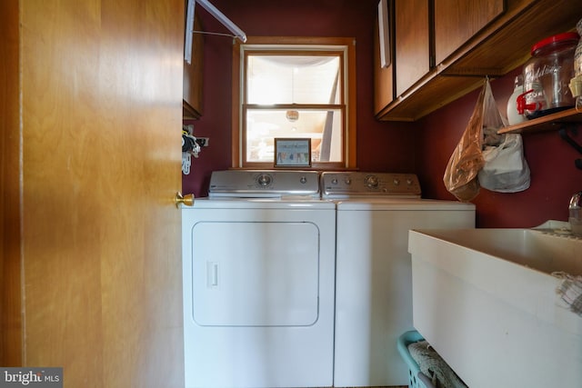5509 Waterview Dr, Cambridge, MD 21613 - washroom featuring cabinet space and washer and clothes dryer
