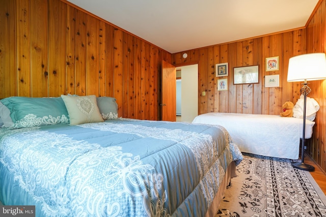 5509 Waterview Dr, Cambridge, MD 21613 - bedroom with wood walls and wood finished floors