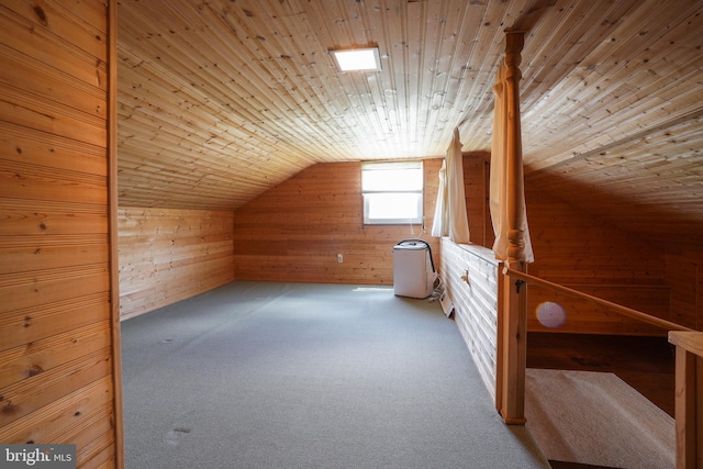 5509 Waterview Dr, Cambridge, MD 21613 - additional living space featuring wood walls, lofted ceiling, wooden ceiling, and carpet floors