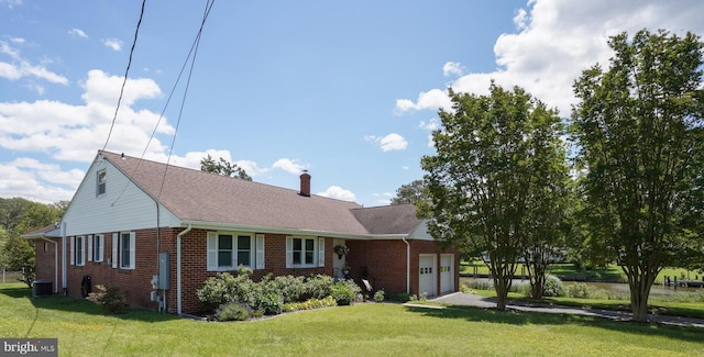 5509 Waterview Dr, Cambridge, MD 21613 - view of front of house with brick siding, an attached garage, central air condition unit, a chimney, and a front lawn