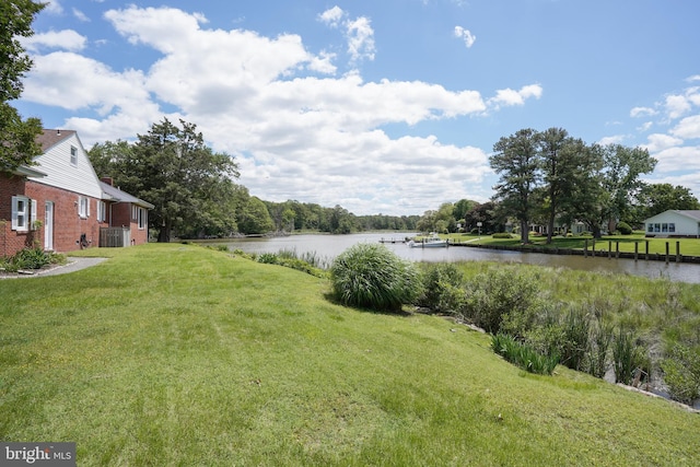 5509 Waterview Dr, Cambridge, MD 21613 - view of grassy yard featuring a water view and central air condition unit