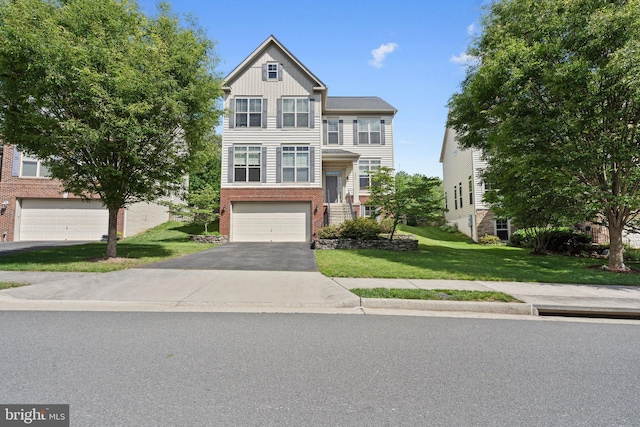 42735 Macauley Pl, Ashburn, VA 20148 - view of front of home featuring asphalt driveway, brick siding, a front lawn, an attached garage, and board and batten siding