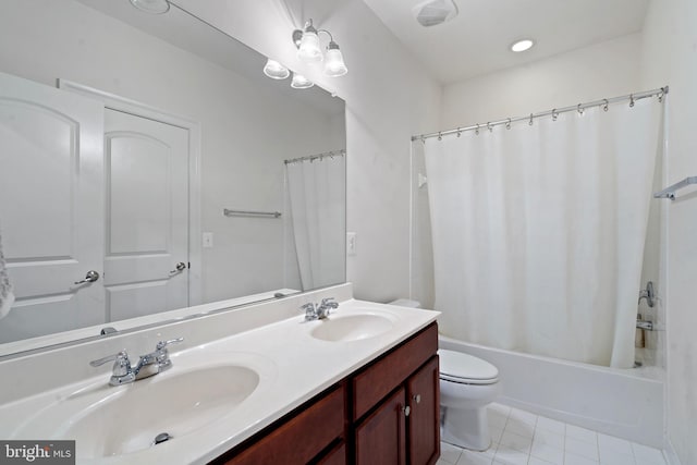 42735 Macauley Pl, Ashburn, VA 20148 - bathroom featuring toilet, double vanity, shower / tub combo, and recessed lighting