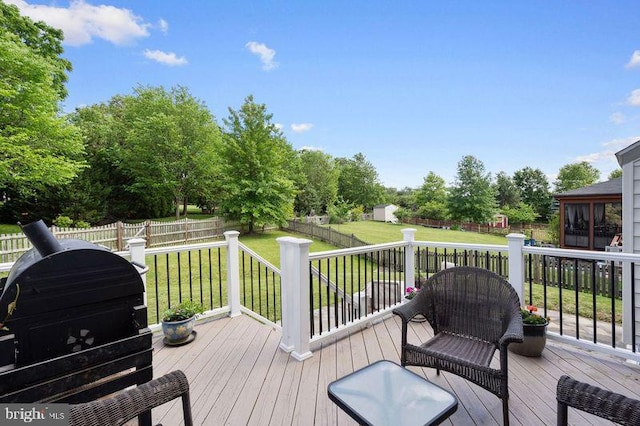 42735 Macauley Pl, Ashburn, VA 20148 - wooden deck with grilling area and view of wooded area