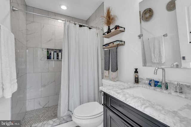 1328 Cox Cv, Stoney Beach, MD 21226 - bathroom featuring vanity, toilet, and tiled shower