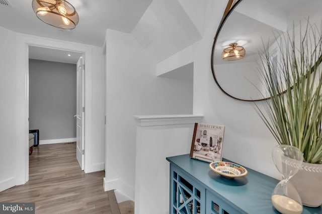 1328 Cox Cv, Stoney Beach, MD 21226 - hallway featuring wood finished floors and baseboards