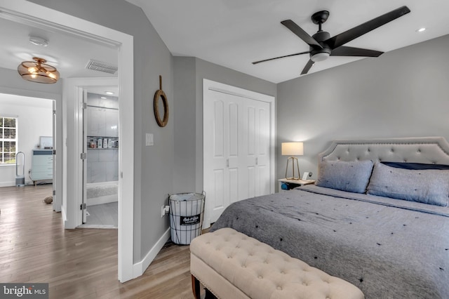 1328 Cox Cv, Stoney Beach, MD 21226 - bedroom featuring wood finished floors, baseboards, a closet, recessed lighting, and a ceiling fan