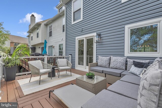 1328 Cox Cv, Stoney Beach, MD 21226 - wooden deck featuring an outdoor living space