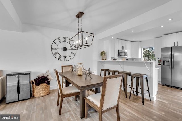 1328 Cox Cv, Stoney Beach, MD 21226 - dining space with recessed lighting, light wood-style floors, and a chandelier