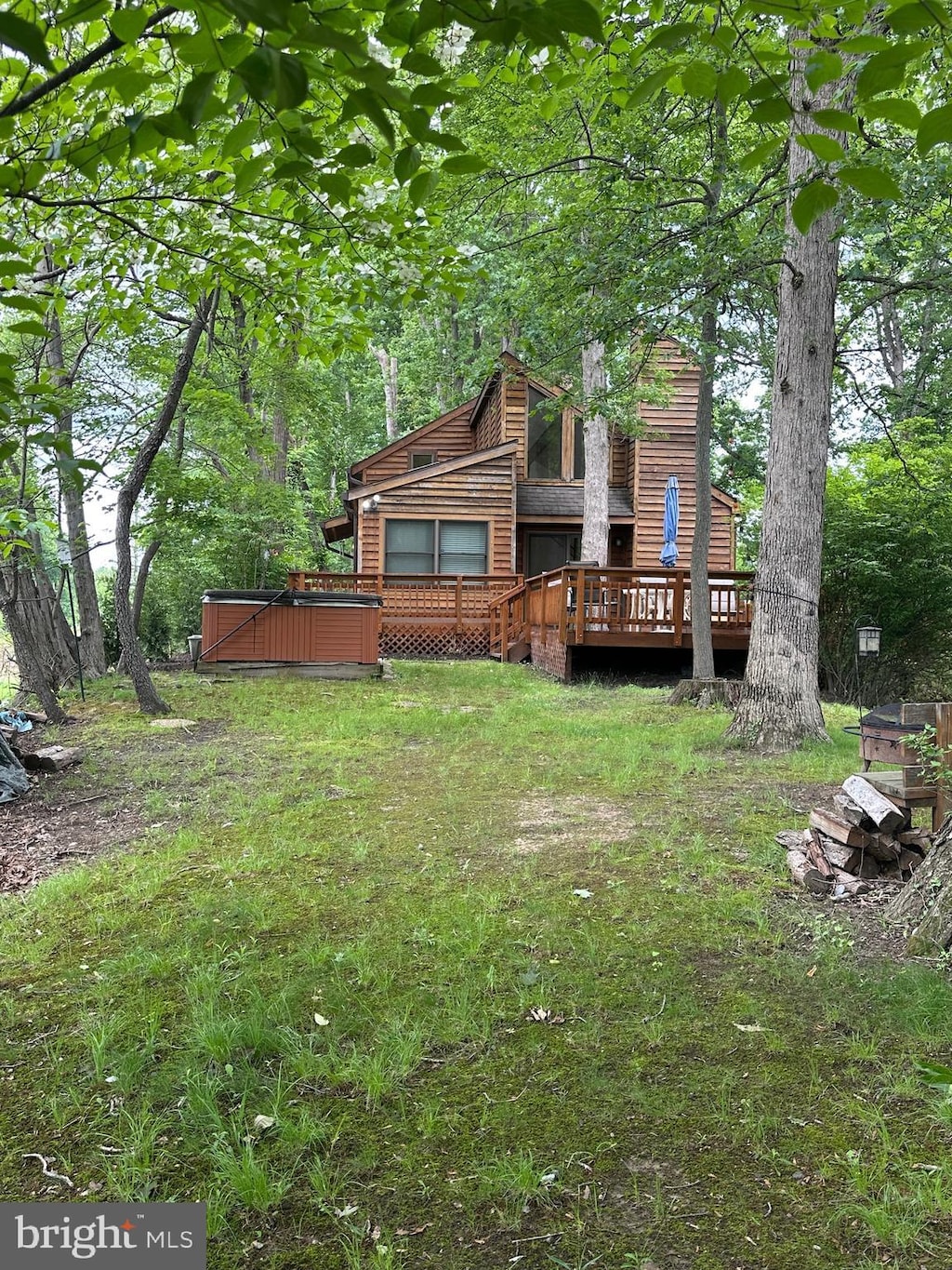 394 Park St SE, Vienna, VA 22180 - back of property featuring a deck and faux log siding