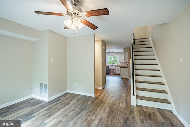 2806 Eagle Rd Unit 2806, West Chester, PA 19382 - unfurnished living room with wood finished floors, stairway, ceiling fan, and baseboards