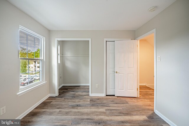 2806 Eagle Rd Unit 2806, West Chester, PA 19382 - unfurnished bedroom with wood finished floors, multiple closets, and baseboards