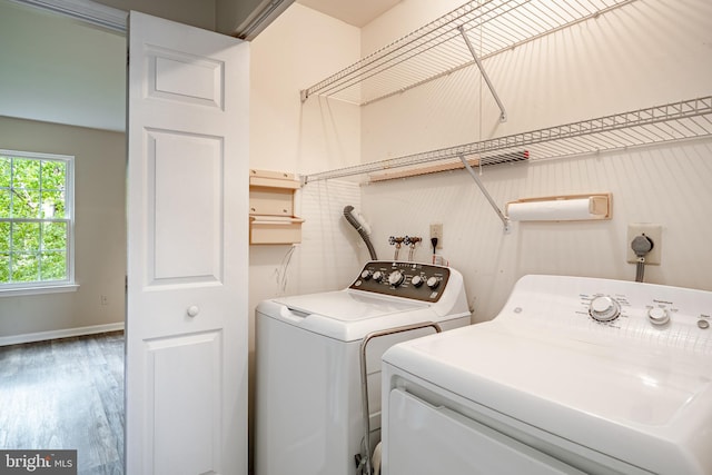 2806 Eagle Rd Unit 2806, West Chester, PA 19382 - washroom featuring washing machine and dryer, wood finished floors, and baseboards