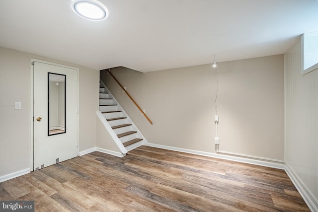 2806 Eagle Rd Unit 2806, West Chester, PA 19382 - finished basement featuring wood finished floors, stairs, and baseboards