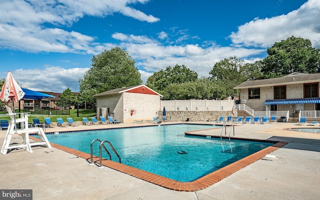 2806 Eagle Rd Unit 2806, West Chester, PA 19382 - community pool with a patio