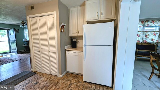 12 Rogers Cir, Newark, DE 19702 - kitchen featuring white appliances, a ceiling fan, white cabinets, and baseboards