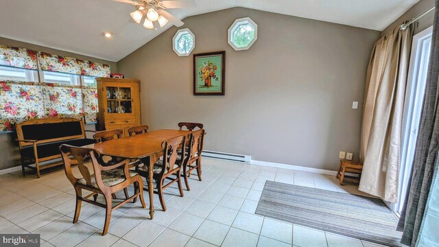 12 Rogers Cir, Newark, DE 19702 - dining space with a ceiling fan, lofted ceiling, light tile patterned floors, baseboards, and a baseboard radiator