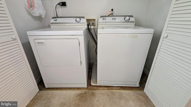 12 Rogers Cir, Newark, DE 19702 - washroom featuring washing machine and clothes dryer and carpet