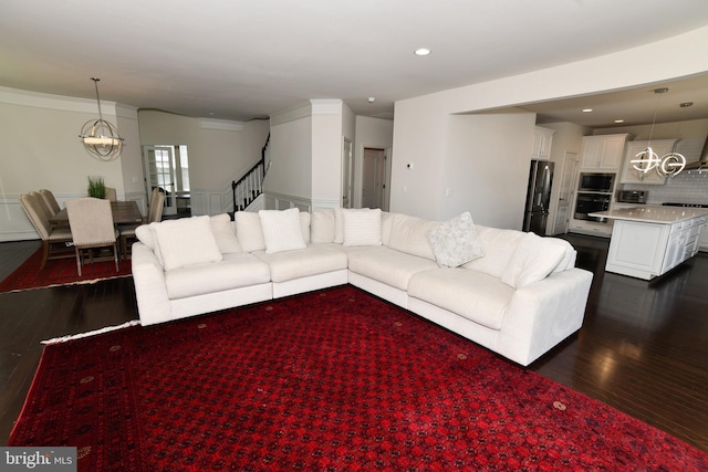 42344 Abney Wood Dr, Chantilly, VA 20152 - living area featuring a chandelier, dark wood-style floors, recessed lighting, and ornamental molding