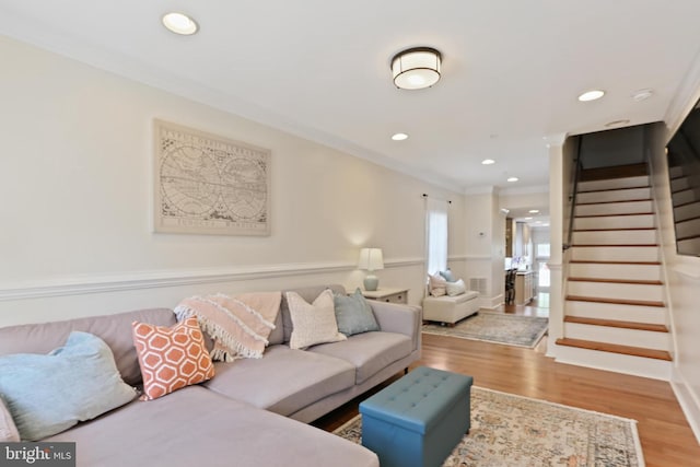 1201 Cooksie St, Baltimore, MD 21230 - living room with stairs, wood finished floors, crown molding, and recessed lighting