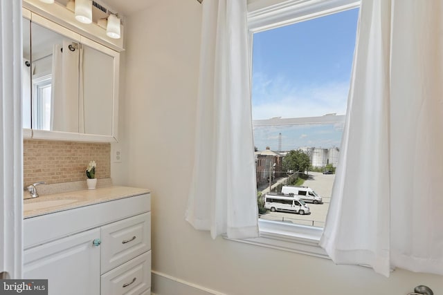 1201 Cooksie St, Baltimore, MD 21230 - bathroom featuring tasteful backsplash and vanity