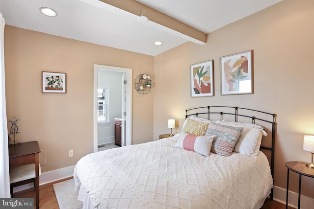 1201 Cooksie St, Baltimore, MD 21230 - bedroom with wood finished floors, beam ceiling, recessed lighting, and ensuite bath