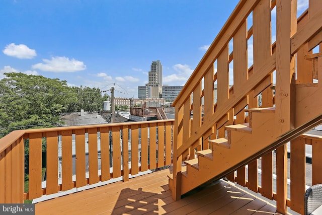 1201 Cooksie St, Baltimore, MD 21230 - wooden deck featuring a city view