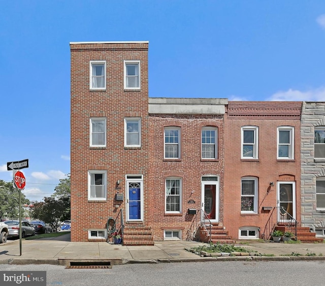 1201 Cooksie St, Baltimore, MD 21230 - view of property with entry steps and brick siding