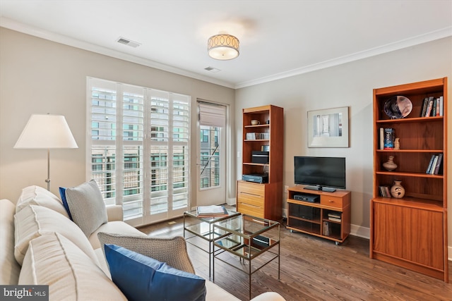510 Diamondback Dr Unit 469, Gaithersburg, MD 20878 - living area featuring crown molding, wood finished floors, and baseboards