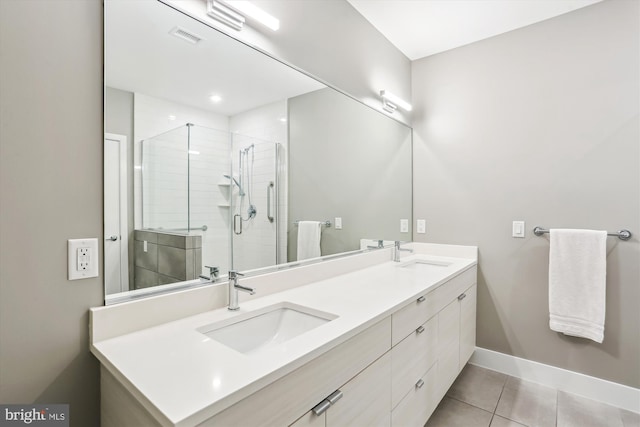 510 Diamondback Dr Unit 469, Gaithersburg, MD 20878 - full bathroom with double vanity, baseboards, a shower stall, and tile patterned flooring