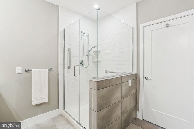 510 Diamondback Dr Unit 469, Gaithersburg, MD 20878 - bathroom featuring a stall shower, tile patterned floors, and baseboards