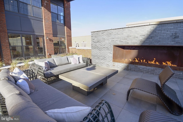 510 Diamondback Dr Unit 469, Gaithersburg, MD 20878 - view of patio / terrace featuring an outdoor living space with a fireplace