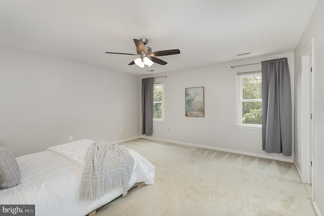 11 Basalt Dr, Fredericksburg, VA 22406 - carpeted bedroom featuring multiple windows and ceiling fan