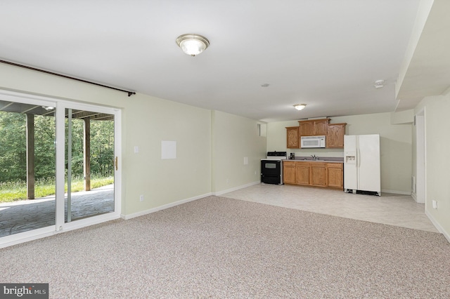 11 Basalt Dr, Fredericksburg, VA 22406 - unfurnished living room with baseboards and light colored carpet