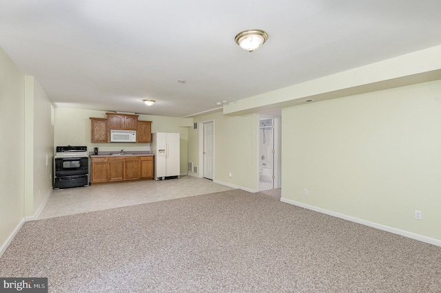 11 Basalt Dr, Fredericksburg, VA 22406 - unfurnished living room with a sink and light colored carpet