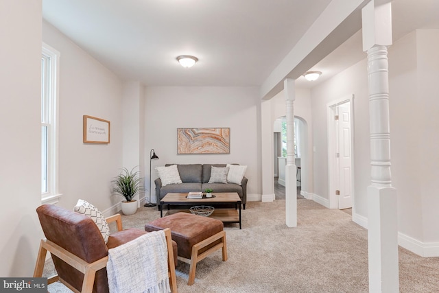 267 S 12th St, Lebanon, PA 17042 - living room with carpet floors, baseboards, and arched walkways
