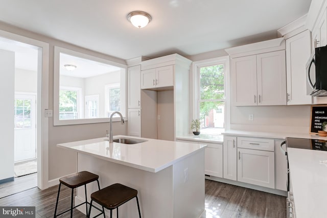 267 S 12th St, Lebanon, PA 17042 - kitchen with a sink, white cabinets, healthy amount of natural light, and light countertops