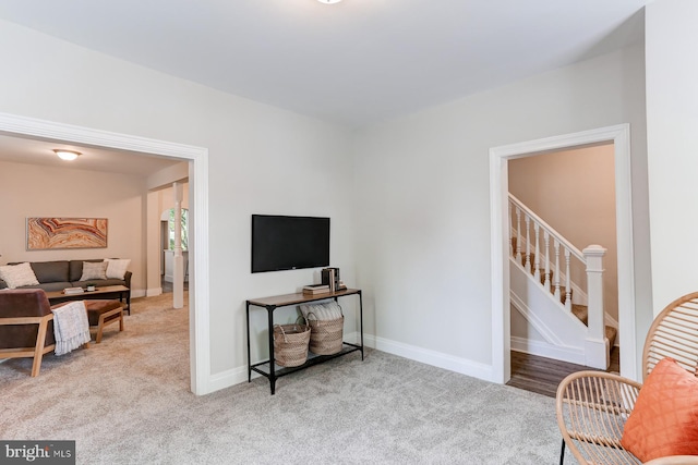 267 S 12th St, Lebanon, PA 17042 - living area with carpet floors, stairway, and baseboards