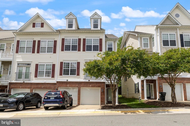 1859 Cedar Cove Way Unit 201, Woodbridge, VA 22191 - view of property featuring an attached garage and brick siding
