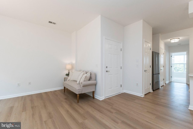 1859 Cedar Cove Way Unit 201, Woodbridge, VA 22191 - sitting room featuring light wood-style floors and baseboards