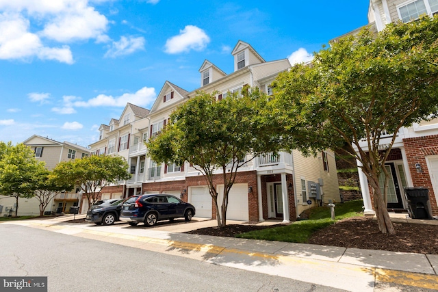 1859 Cedar Cove Way Unit 201, Woodbridge, VA 22191 - view of building exterior with a garage and a residential view