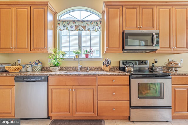 137 Keller Way, Mays Landing, NJ 08330 - kitchen featuring appliances with stainless steel finishes, a sink, stone counters, and light tile patterned floors